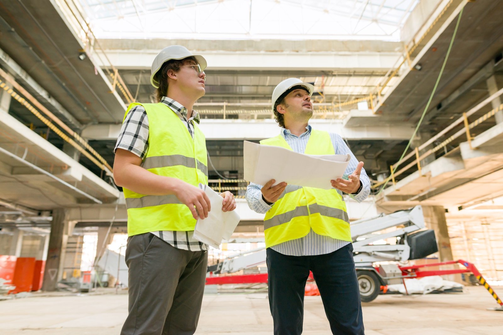 Two business builder people at construction site